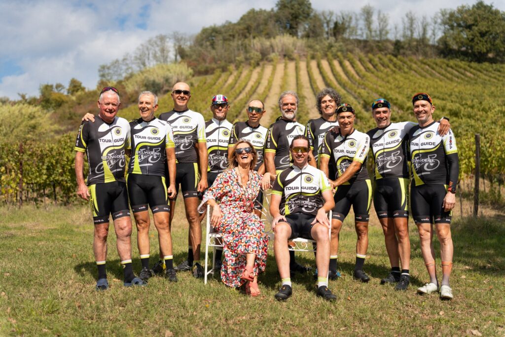 Photo of the Belvedere Bike Hotel owner and bike guides, all considered family.