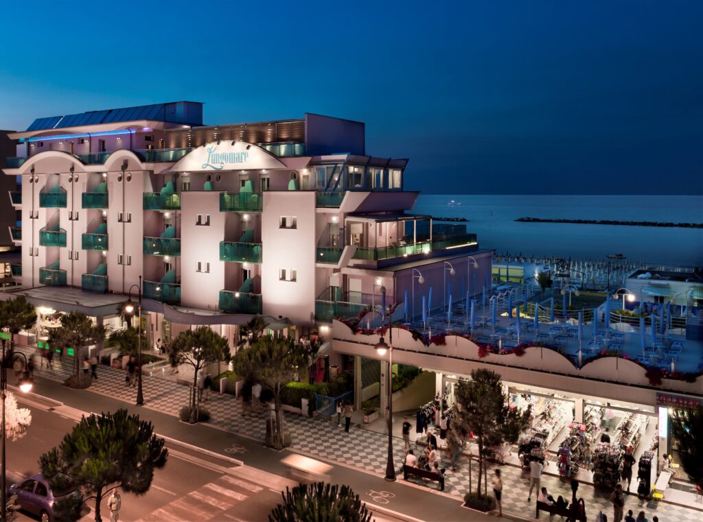 Lungomare Bike Hotel at night as it sits directly on the beach