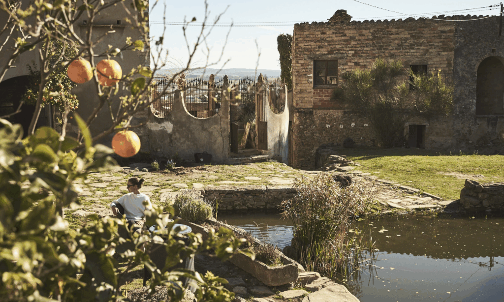A photo of the rustic architecture and setting found at Rocacorba's bike hotel property 